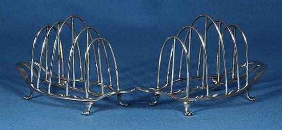 A pair of George V silver toast racks, by George Howson, Length 153mm weight 8.1oz/253grms